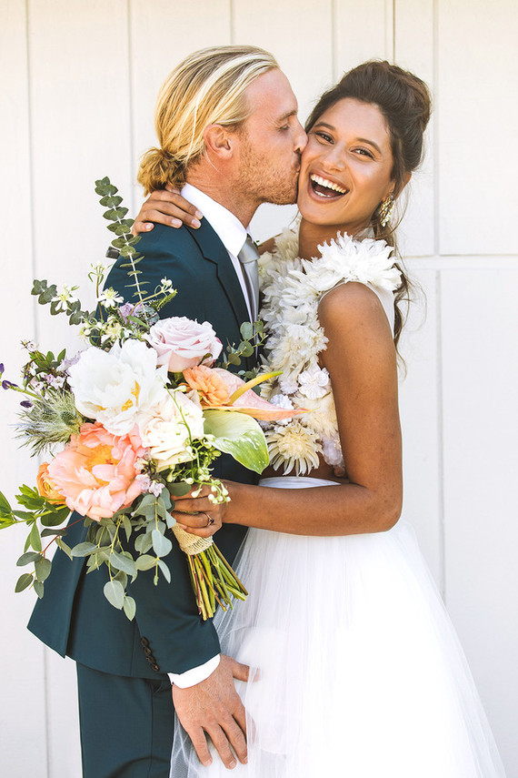 Surf inspired beach wedding in Montauk with the world's cutest dress