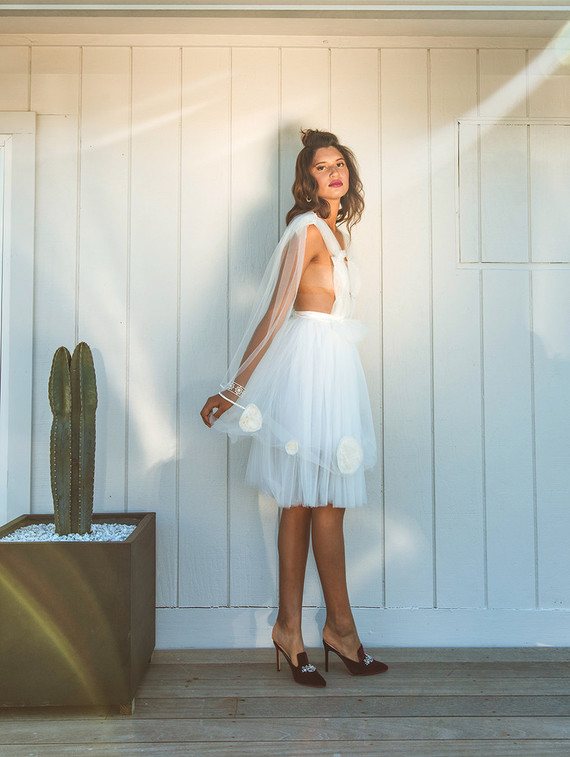 Surf inspired beach wedding in Montauk with the world's cutest dress
