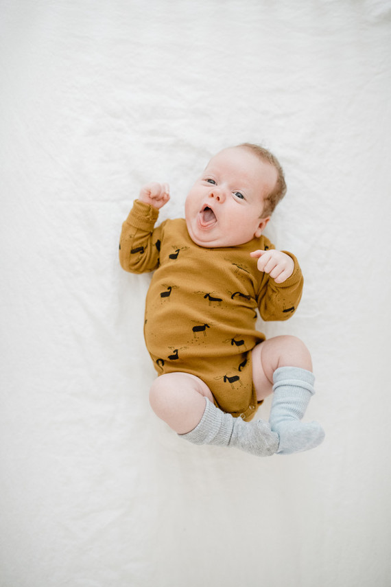 Earthy modern pastels for a baby boy's nursery in Portland from Paige Jones
