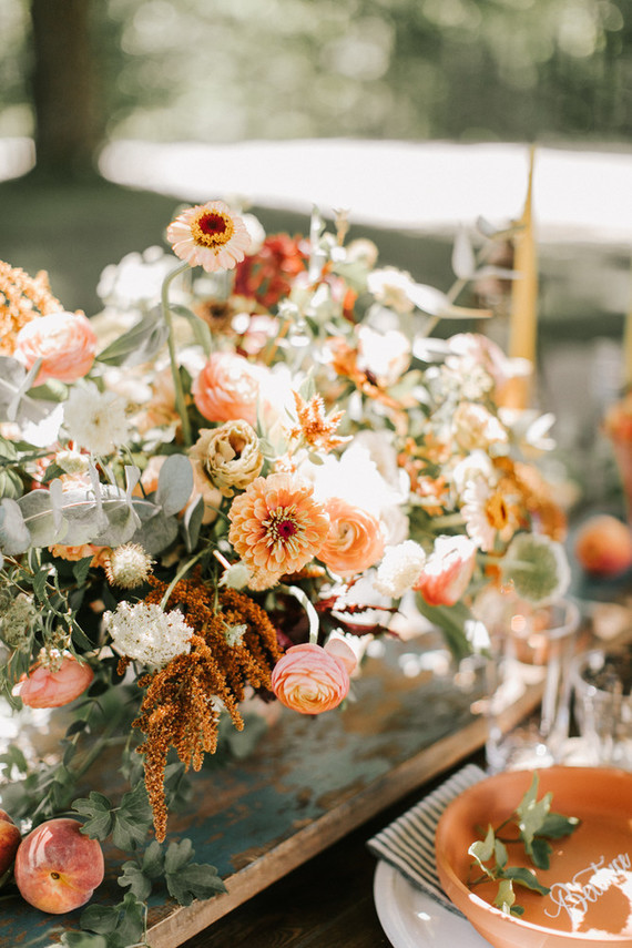 late summer flower arrangement in terracotta and peach