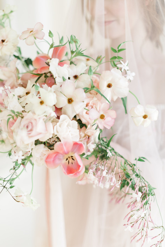A stunning bridal editorial with a giant pink camellia tree