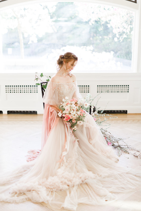 A stunning bridal editorial with a giant pink camellia tree