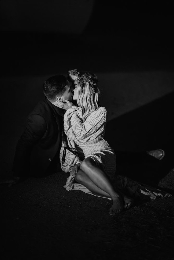 Boho vow renewal with a palm frond teepee at Wolf Feather Honey Farm