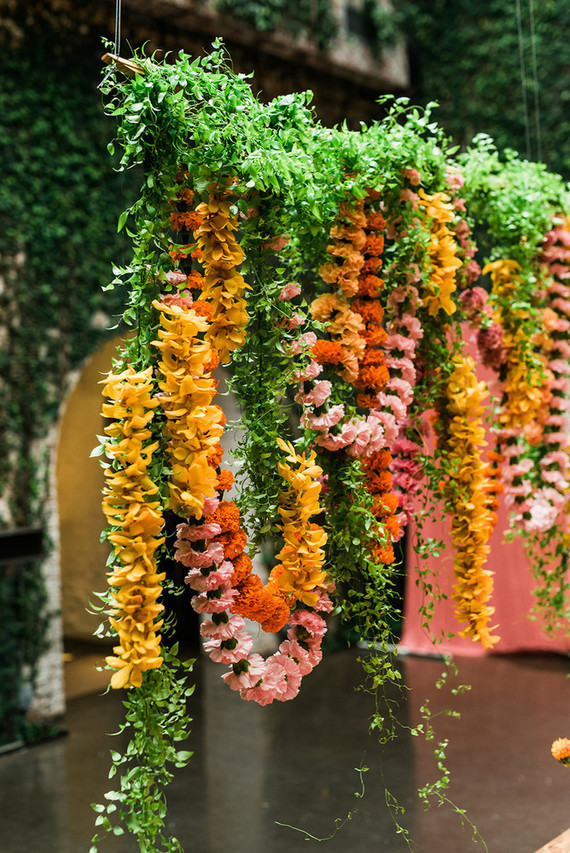 Ultra colorful wedding design inspired by Indian floral garlands and Day of the Dead Inspiration