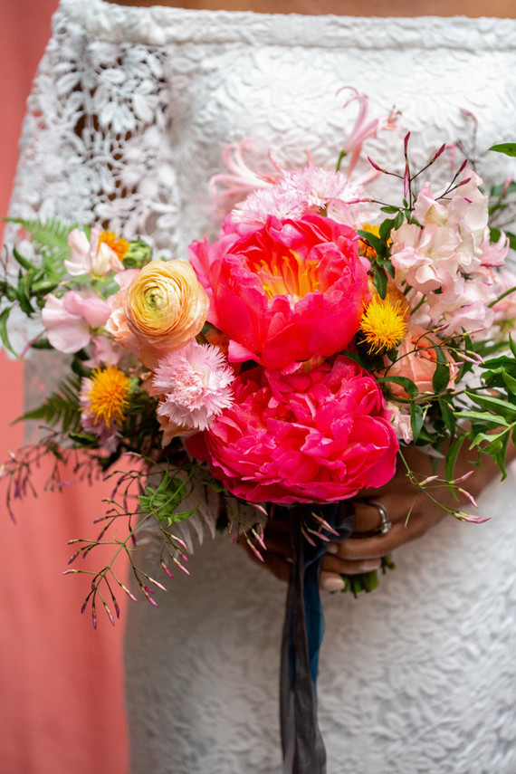 Ultra colorful wedding design inspired by Indian floral garlands and Day of the Dead Inspiration