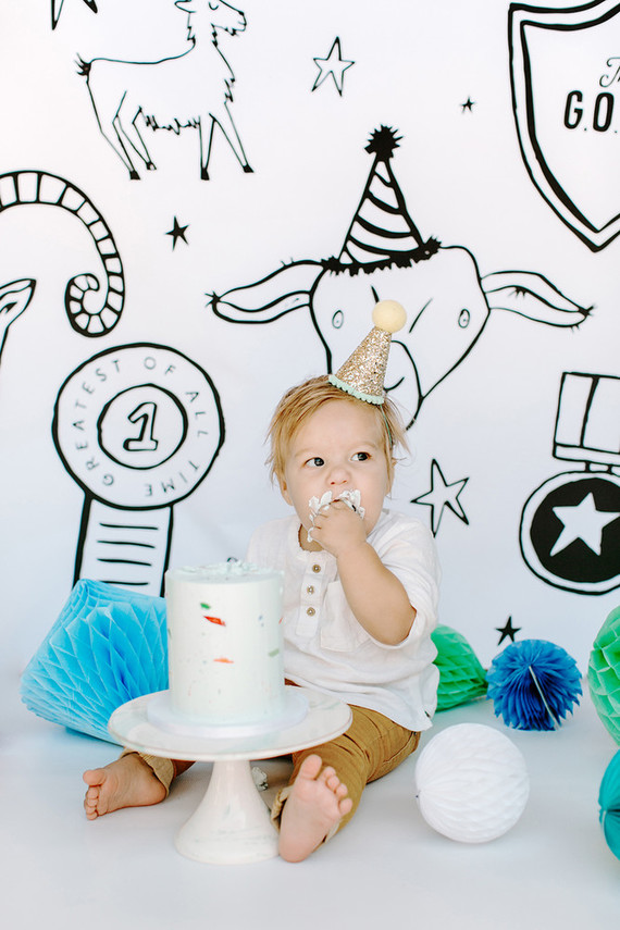 Greatest of All Time (G.O.A.T.) first birthday cake smash session Inspiration