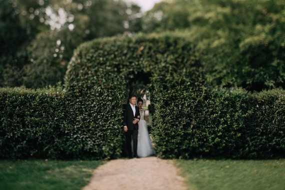 A moody dream garden wedding for a fashion forward couple at Palacio Villahermosa in Spain
