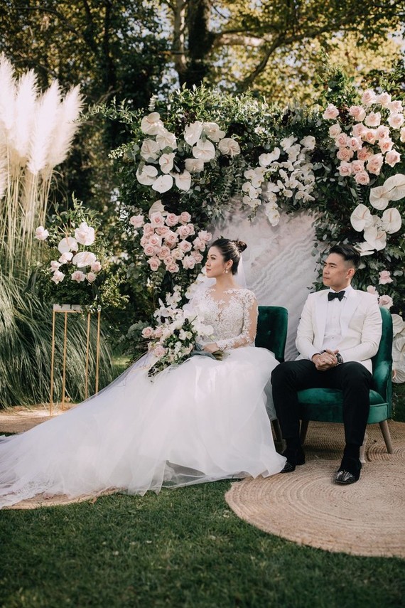 A moody dream garden wedding for a fashion forward couple at Palacio Villahermosa in Spain