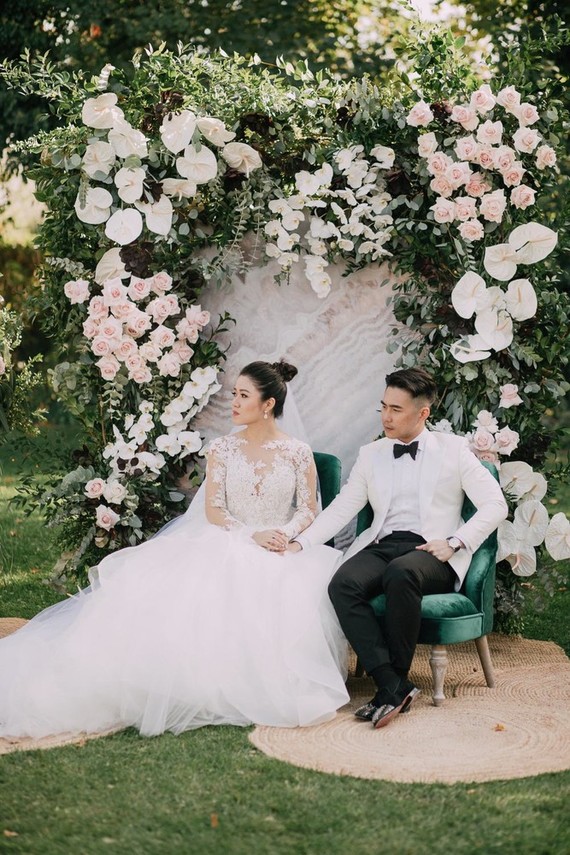 A moody dream garden wedding for a fashion forward couple at Palacio Villahermosa in Spain