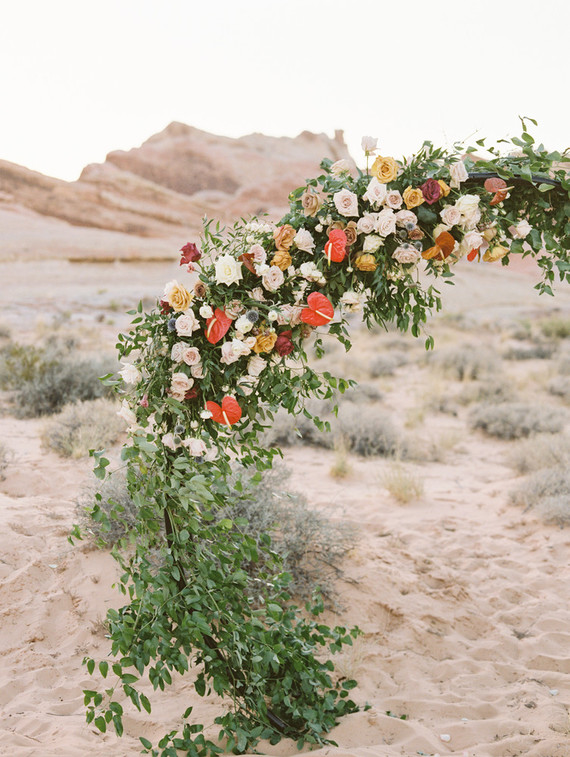 Floral wedding arch in the desert