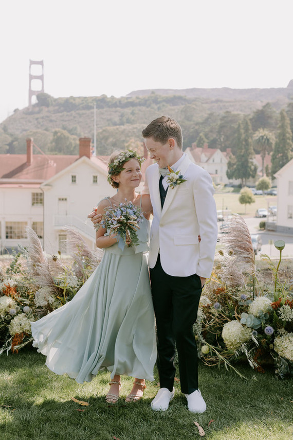 Organic same-sex wedding at Cavallo Point in San Francisco with the couple's children