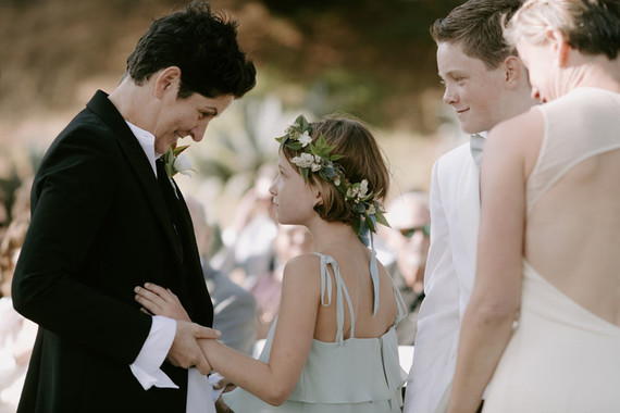 Organic same-sex wedding at Cavallo Point in San Francisco with the couple's children