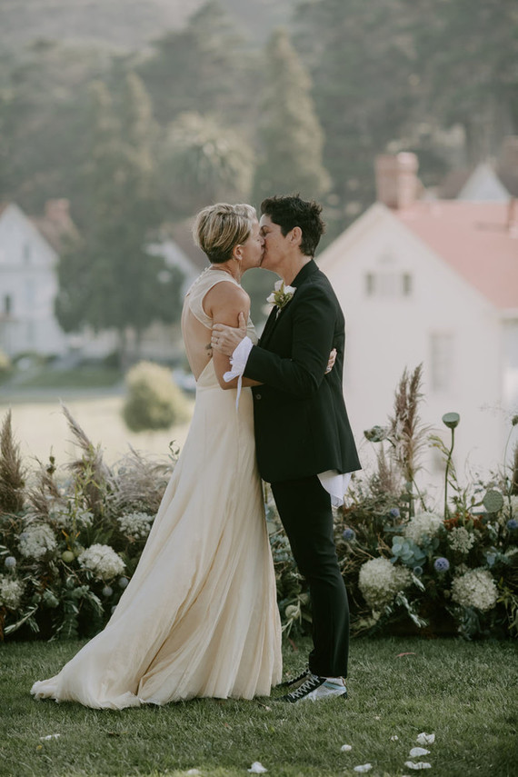 Organic same-sex wedding at Cavallo Point in San Francisco with the couple's children