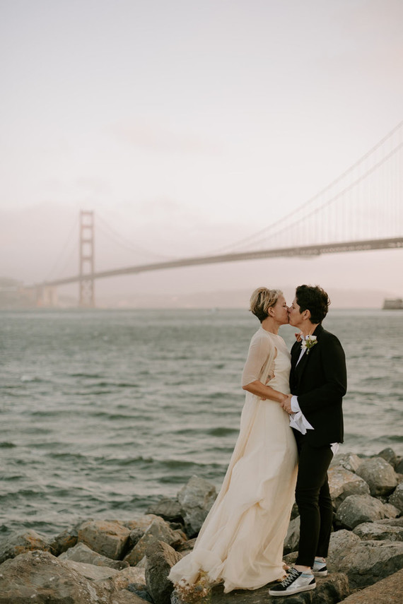 Organic same-sex wedding at Cavallo Point in San Francisco with the couple's children