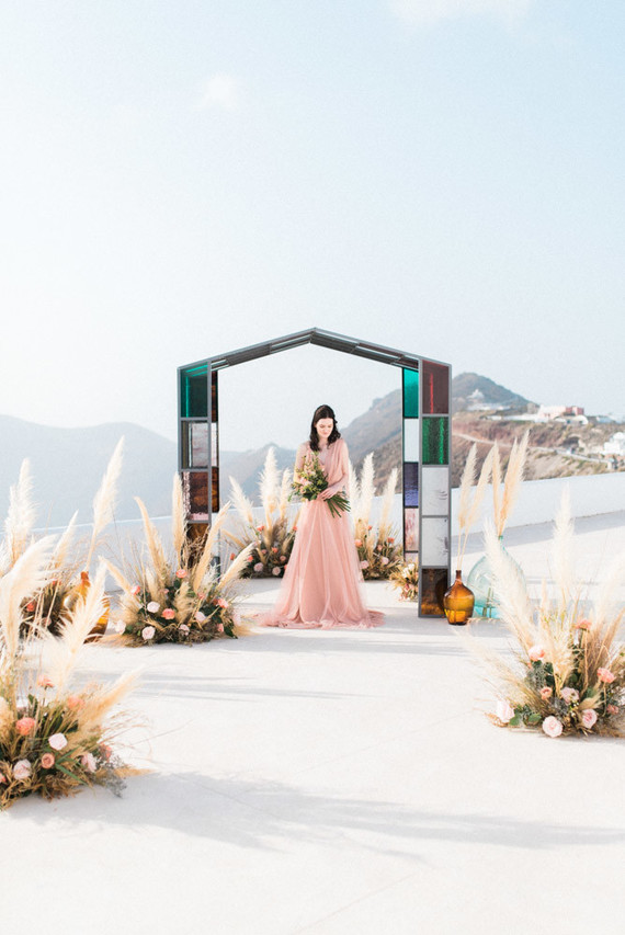Art nouveau inspired Glasshouse wedding at Rocabella Hotel in Santorini