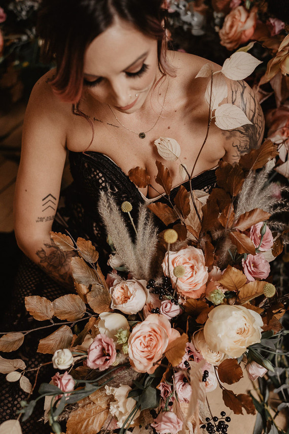 gorgeous fall bridal bouquet with shades of coral and rust