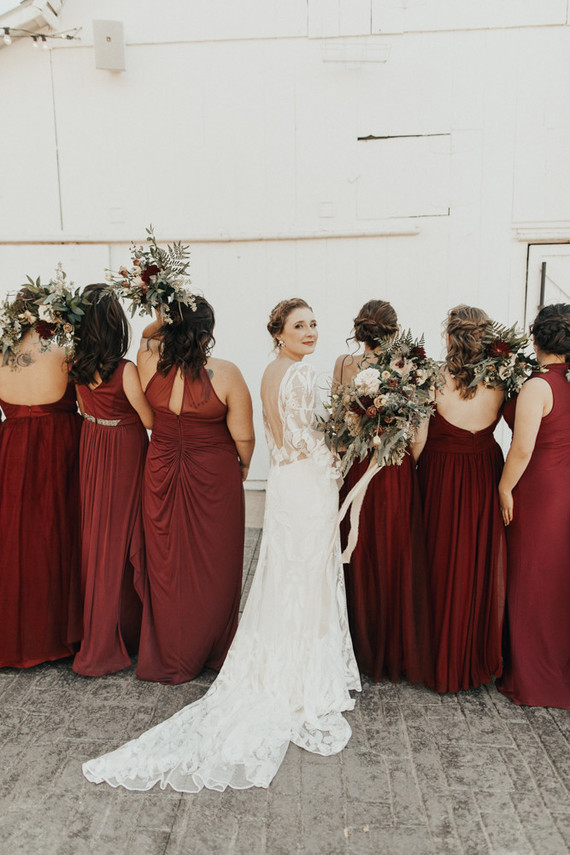 burgundy bridesmaid dresses at dreamy white barn venue in Kansas City