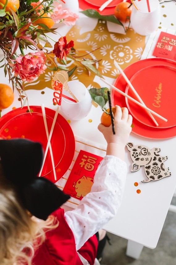Lunar New Year kids party with red and gold details