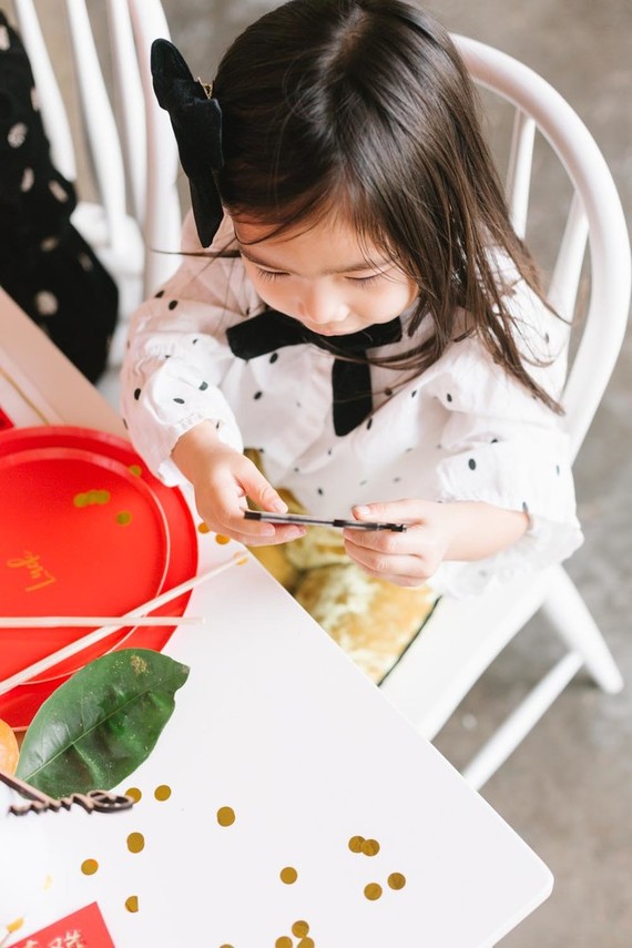Lunar New Year kids party with red and gold details