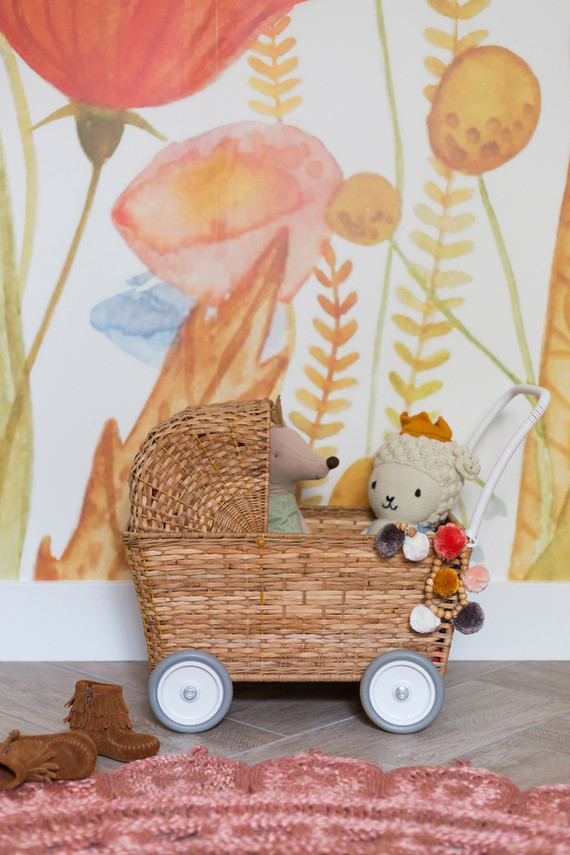 Cara Loren's floral feminine girl's nursery with Lulu & Georgia