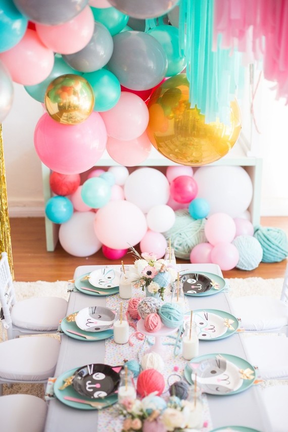 A kitty cat second birthday party with the most incredibly fun decor