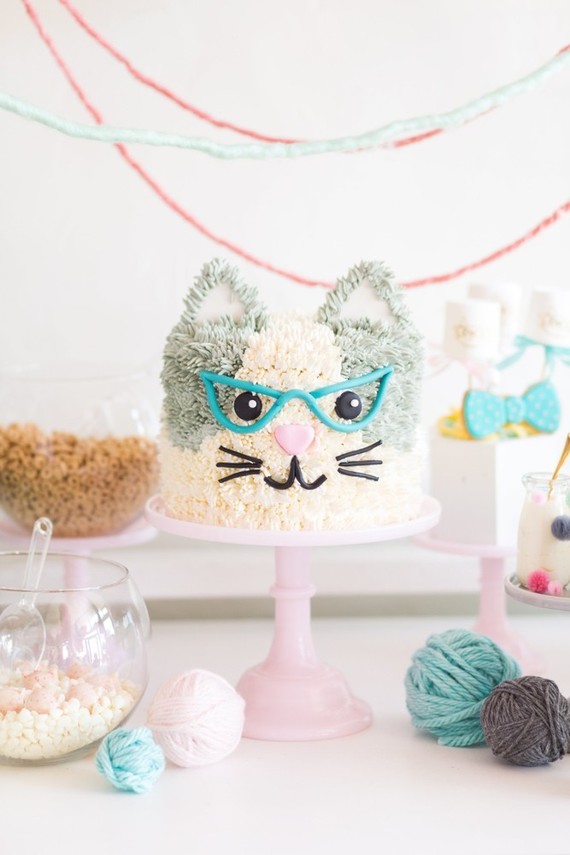 A kitty cat second birthday party with the most incredibly fun decor