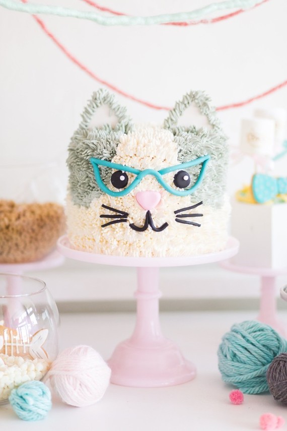 A kitty cat second birthday party with the most incredibly fun decor