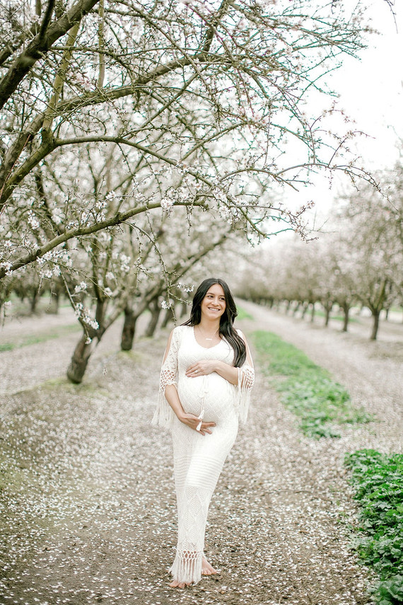 Almond orchard maternity photos in the central valley of California
