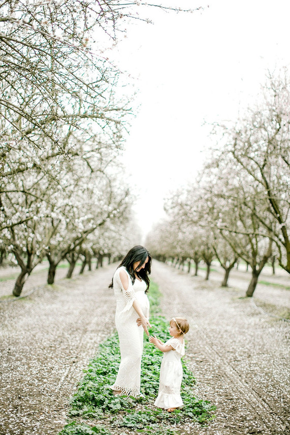 Almond orchard maternity photos in the central valley of California