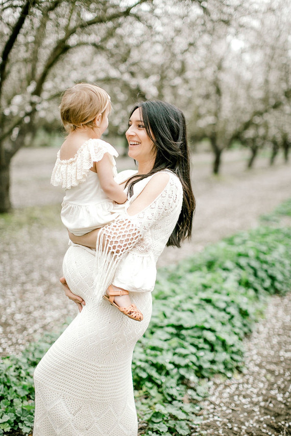 Almond orchard maternity photos in the central valley of California