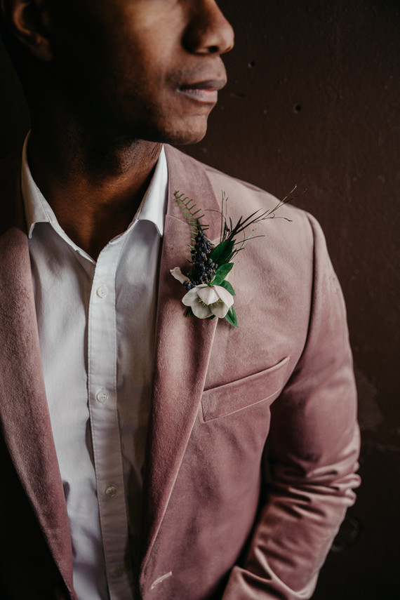 Fashion-forward groom style with a mauve jacket