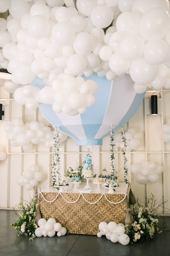 hot air balloon dessert table for an amazing 1st birthday party