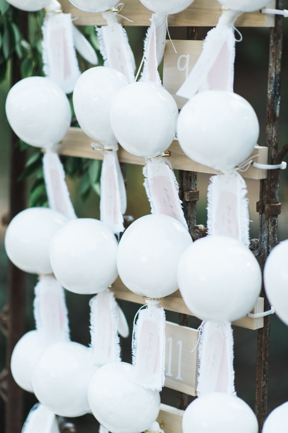 all white maraca escort card display