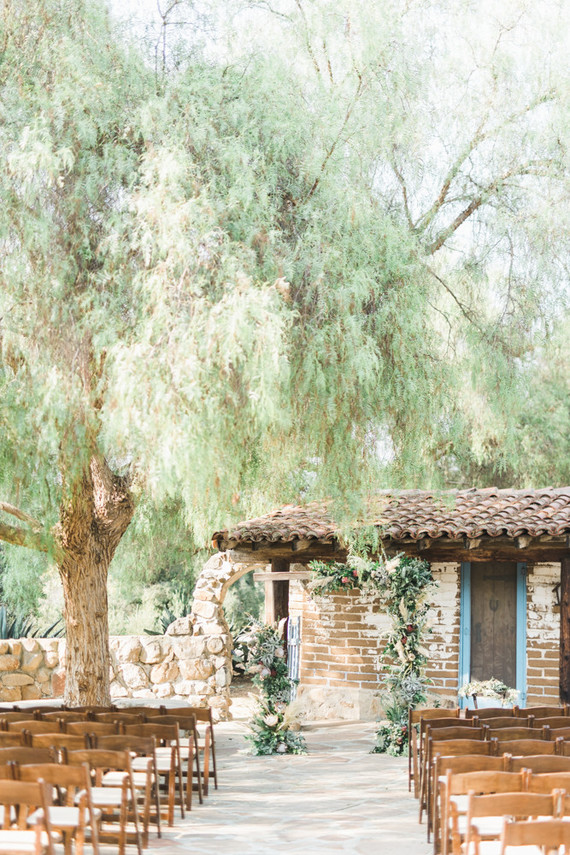 An all white Mexican inspires wedding at the most romantic Spanish venue in San Diego