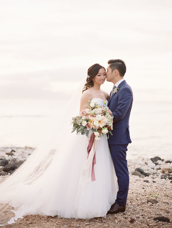 Romantic mauve Maui wedding with the most magical reception setting at Olowalu Plantation House