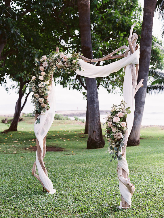 Romantic mauve Maui wedding with the most magical reception setting at Olowalu Plantation House