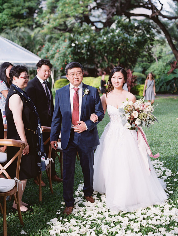 Romantic mauve Maui wedding with the most magical reception setting at Olowalu Plantation House