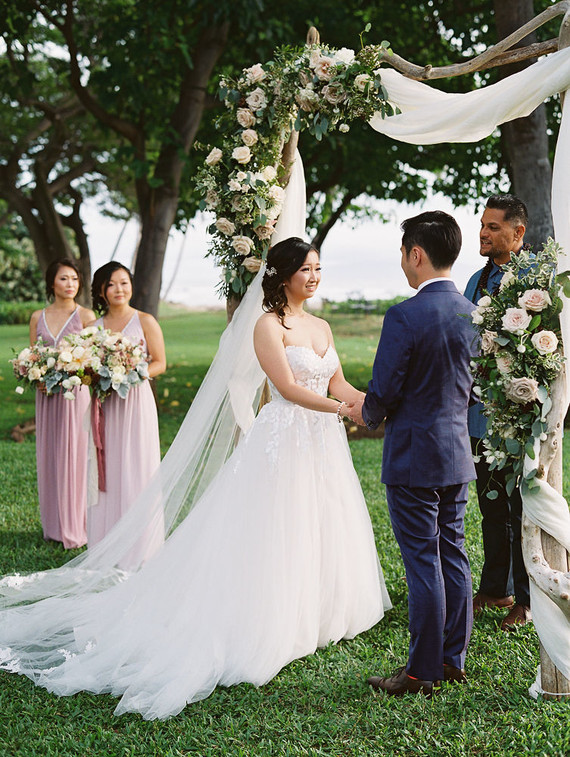 Romantic mauve Maui wedding with the most magical reception setting at Olowalu Plantation House