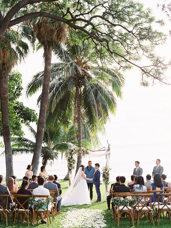 Romantic mauve Maui wedding with the most magical reception setting at Olowalu Plantation House