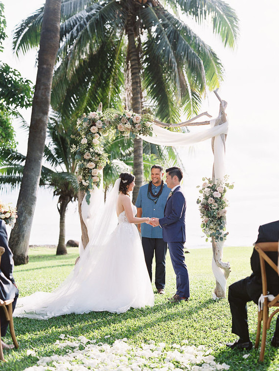 Romantic mauve Maui wedding with the most magical reception setting at Olowalu Plantation House