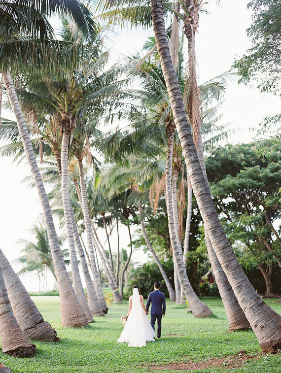 Romantic mauve Maui wedding with the most magical reception setting at Olowalu Plantation House