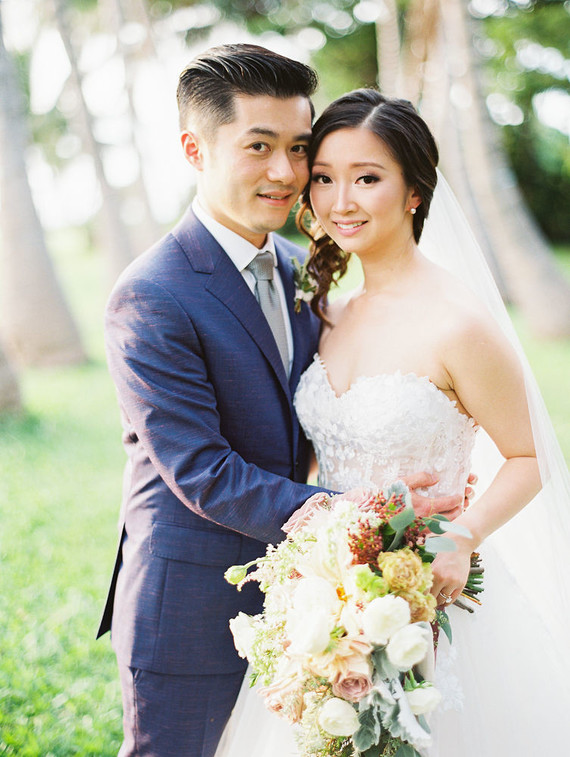 Romantic mauve Maui wedding with the most magical reception setting at Olowalu Plantation House