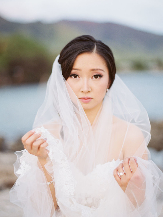 Romantic mauve Maui wedding with the most magical reception setting at Olowalu Plantation House