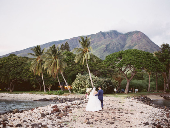 Romantic mauve Maui wedding with the most magical reception setting at Olowalu Plantation House
