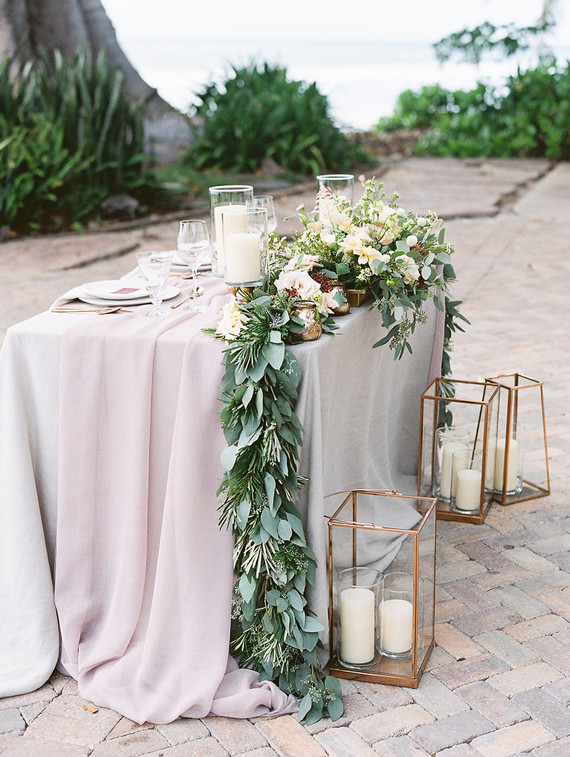 Romantic mauve Maui wedding with the most magical reception setting at Olowalu Plantation House