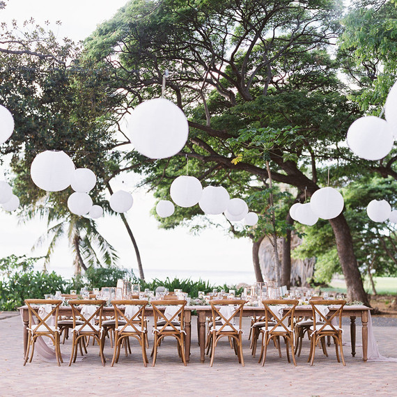 Romantic mauve Maui wedding with the most magical reception setting at Olowalu Plantation House