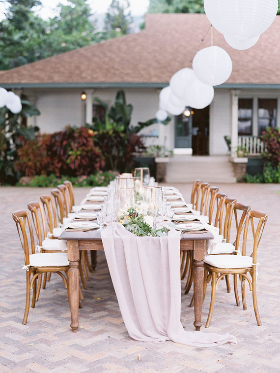Romantic mauve Maui wedding with the most magical reception setting at Olowalu Plantation House