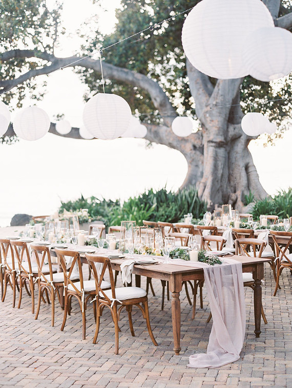 Romantic mauve Maui wedding with the most magical reception setting at Olowalu Plantation House