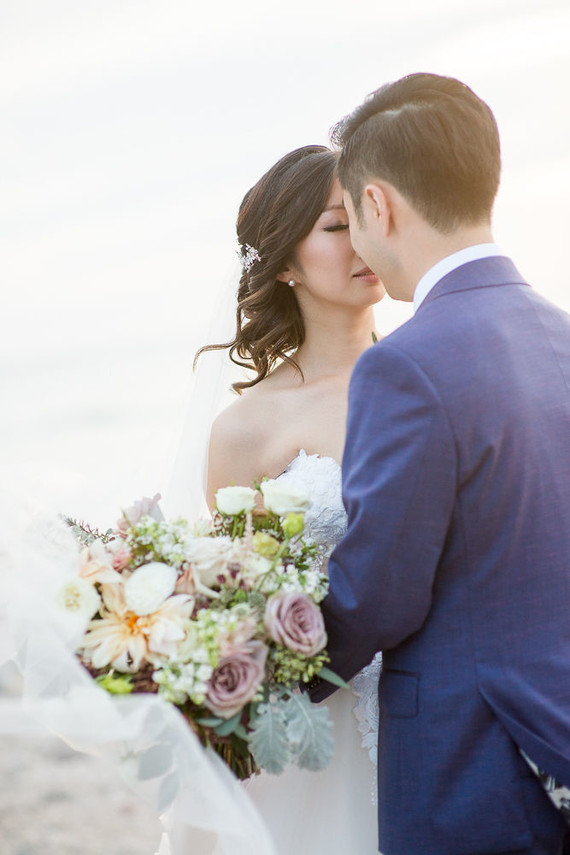 Romantic mauve Maui wedding with the most magical reception setting at Olowalu Plantation House