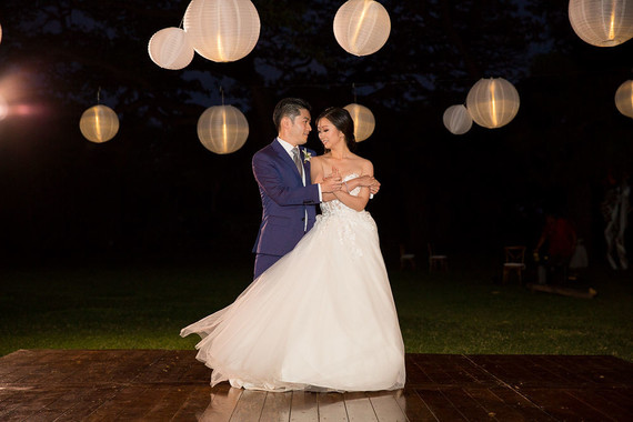 Romantic mauve Maui wedding with the most magical reception setting at Olowalu Plantation House